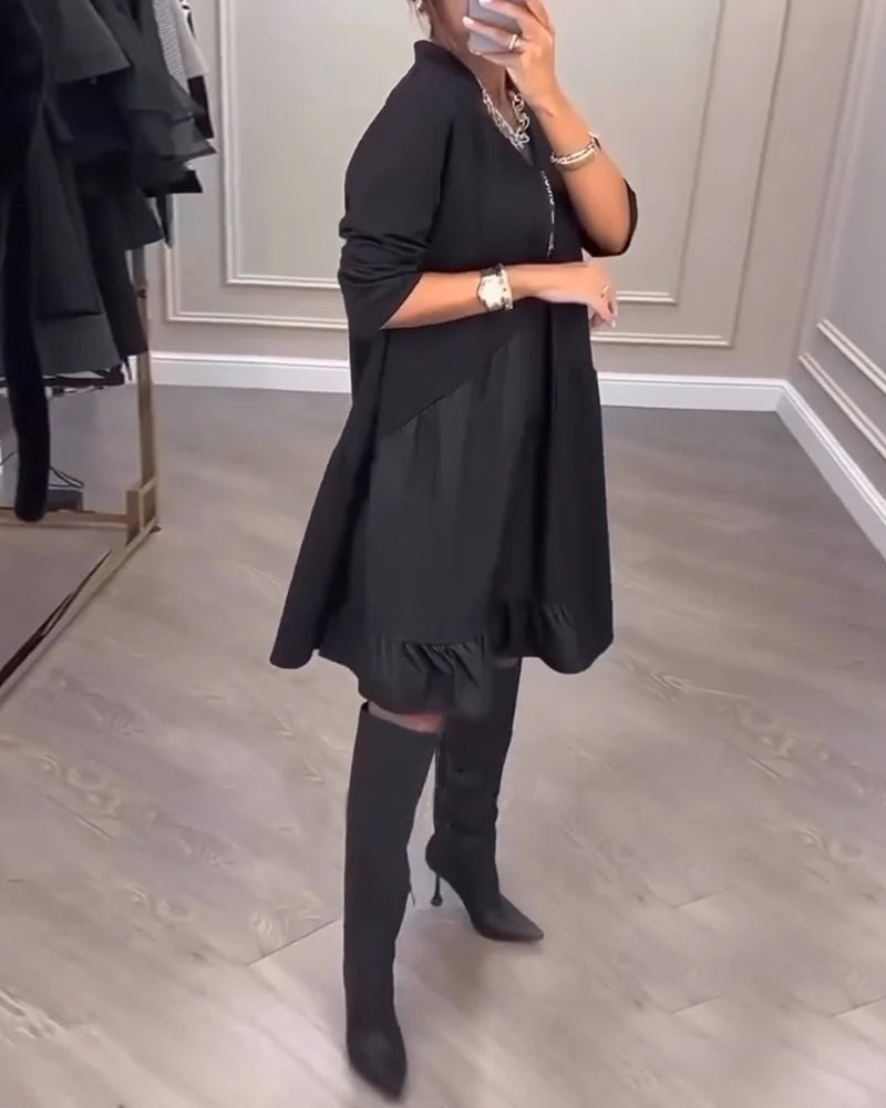 COLLEEN | V-NECK-SWINGKLEID MIT ZIPPER-FRONT UND RÜSCHENSAUM