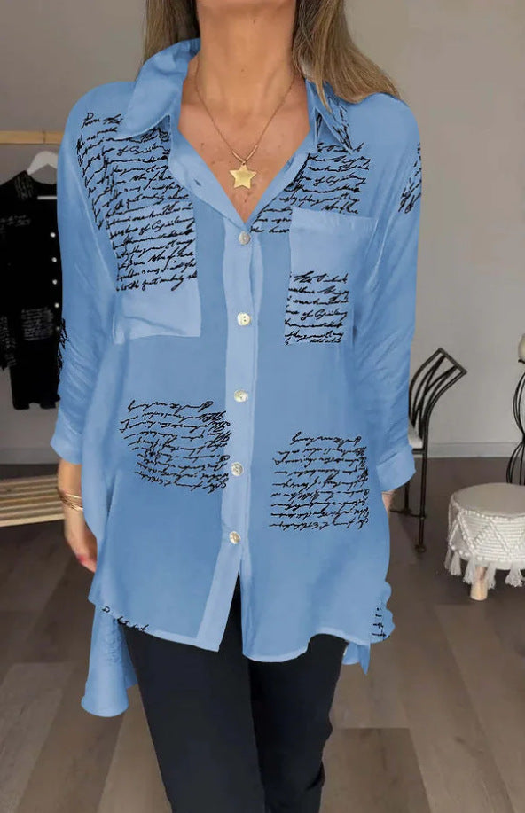 GLYNIS | OVERSIZED BLUSE MIT SCHRIFTZUG-PRINT UND KNOPFLEISTE