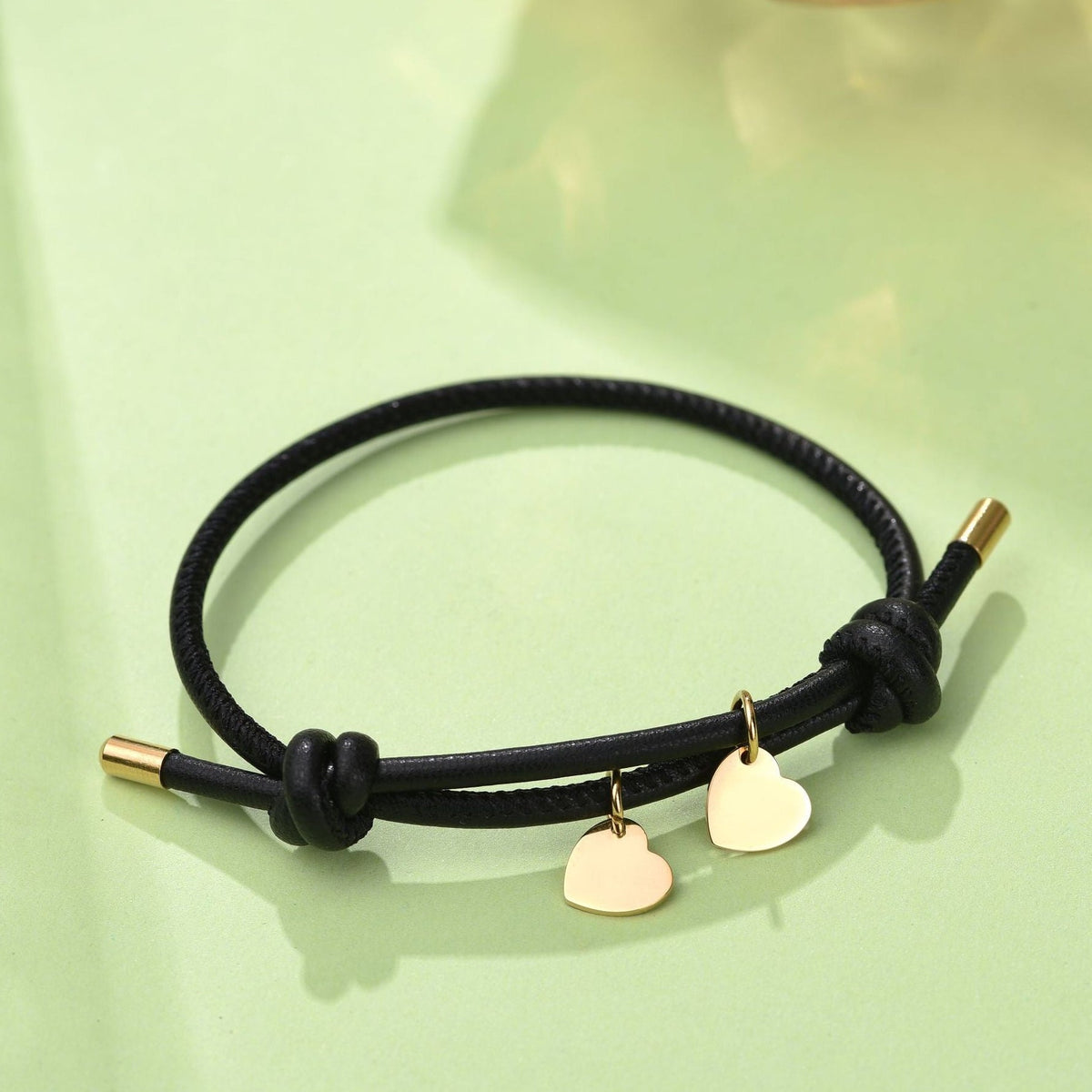 LEDERARMBAND MIT DOPPELHERZ