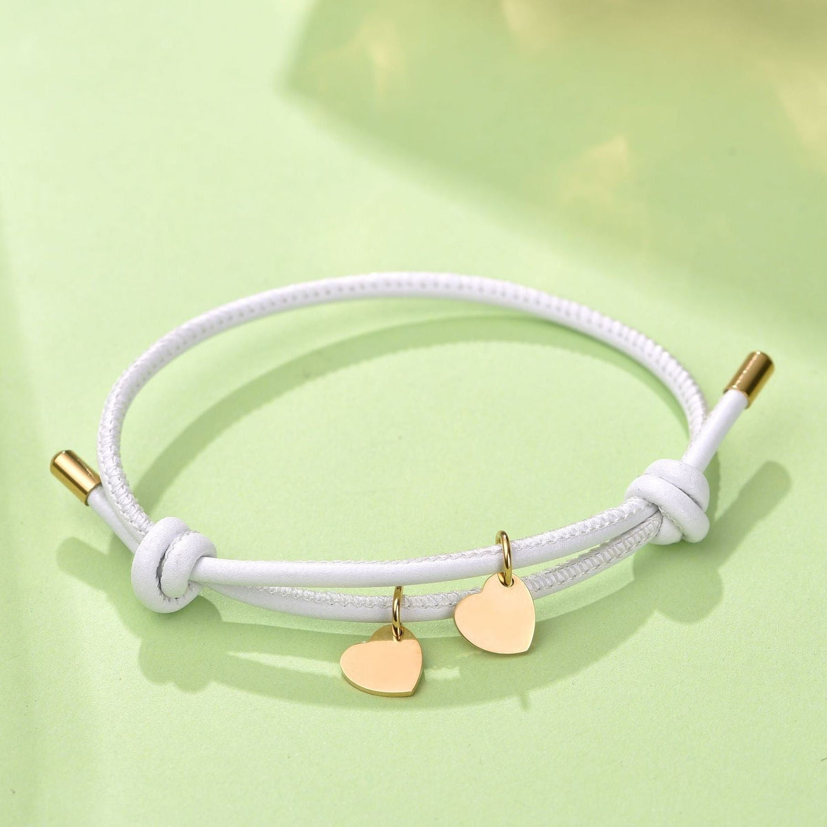 LEDERARMBAND MIT DOPPELHERZ