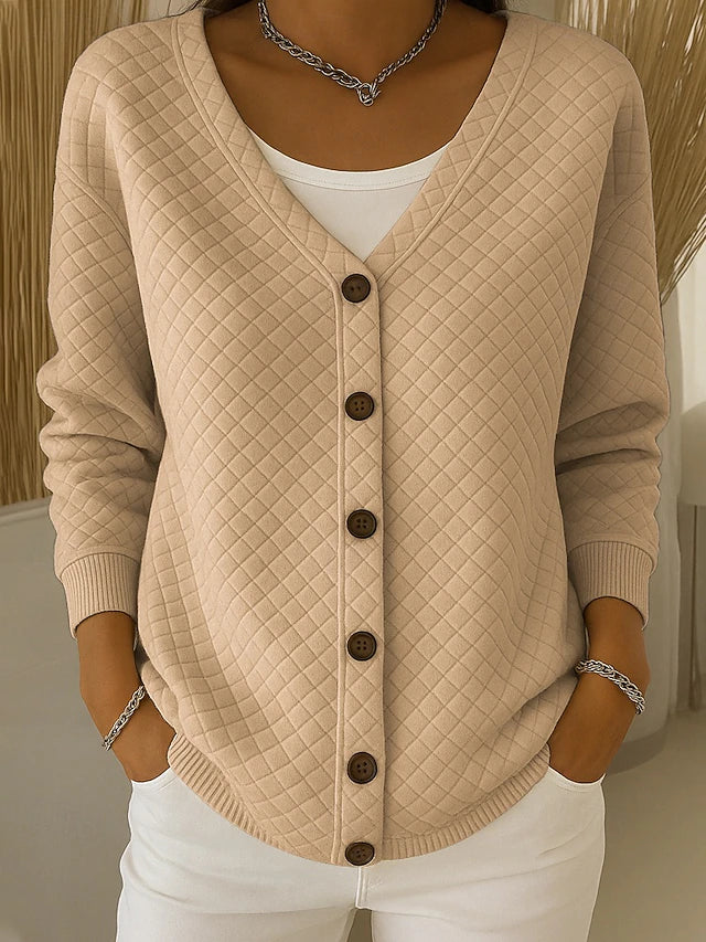 LAVERNE | GESTEPPTE KNOPFLEISTEN-STRICKJACKE