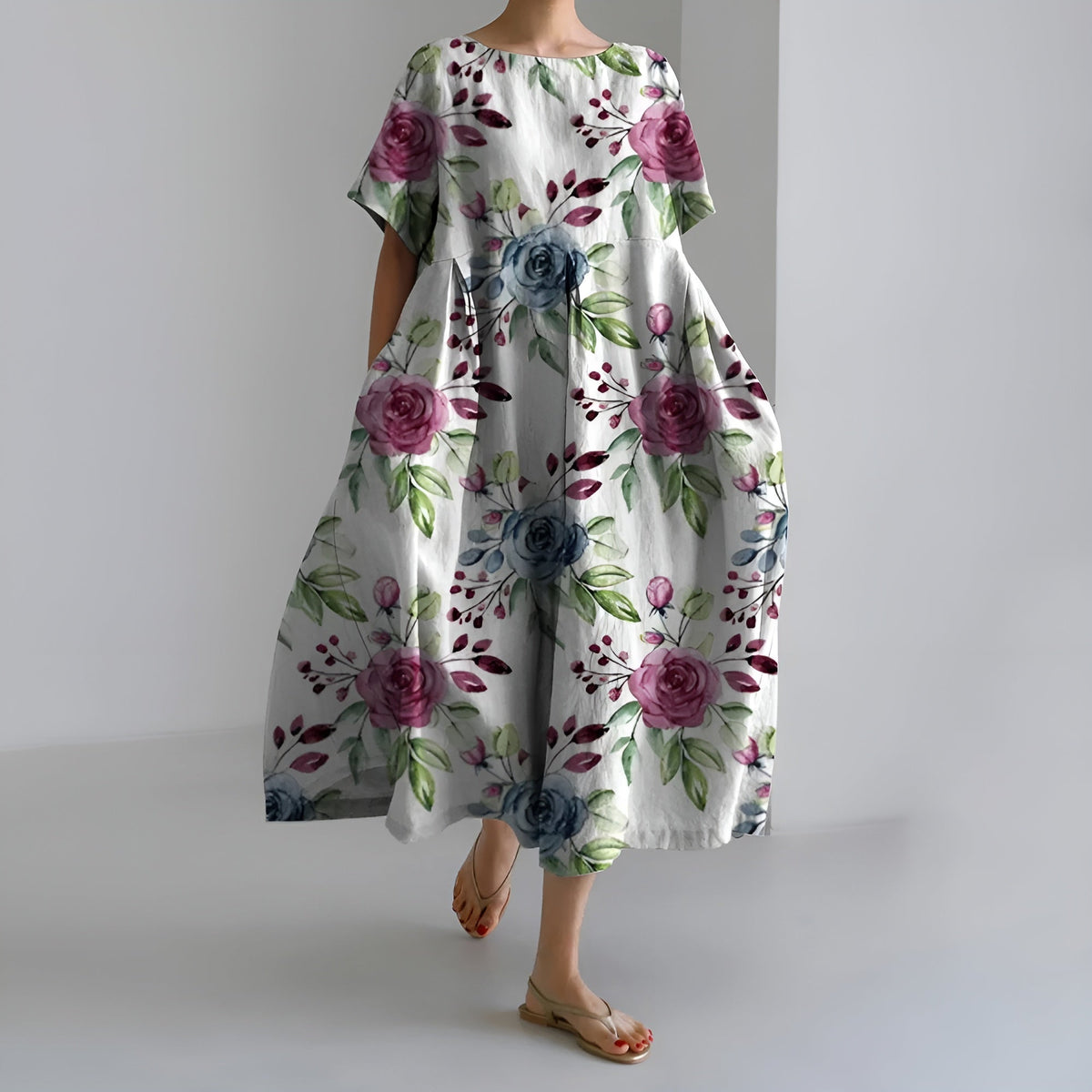 MEERI | KÜNSTLERISCHES MAXIKLEID MIT VINTAGE-BLUMENMUSTER UND UNBEKÜMMERTER ELEGANZ