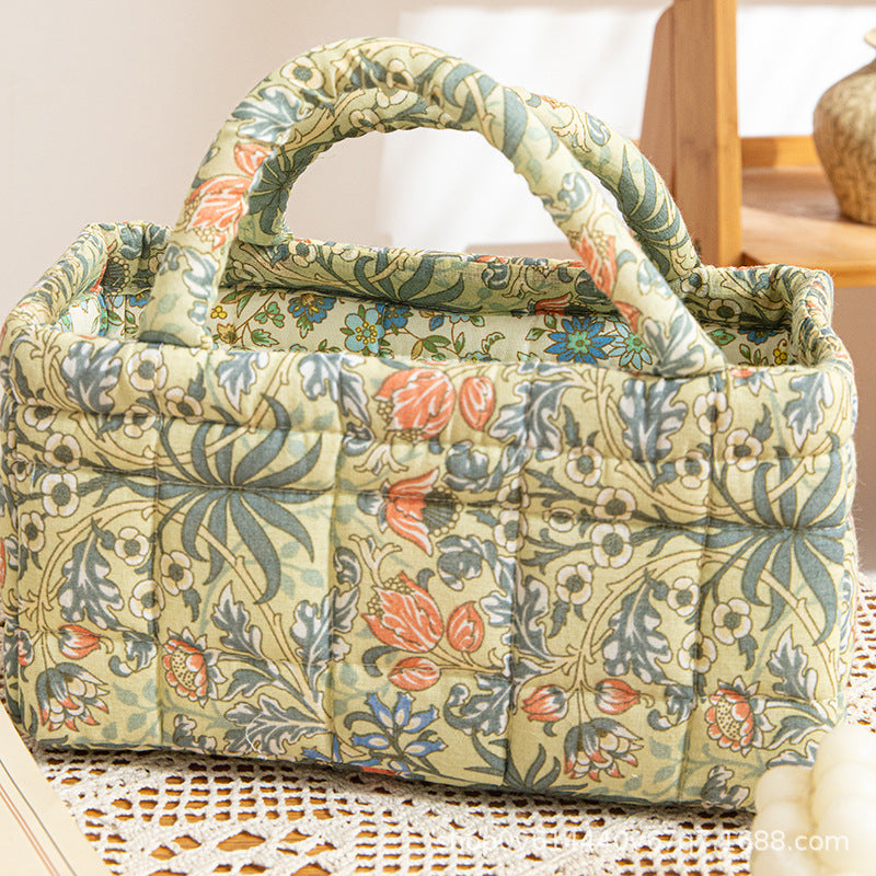 BLOOMHAVEN | GESTEPPTER AUFBEWAHRUNGSKORB MIT VINTAGE-BLUMENMUSTER