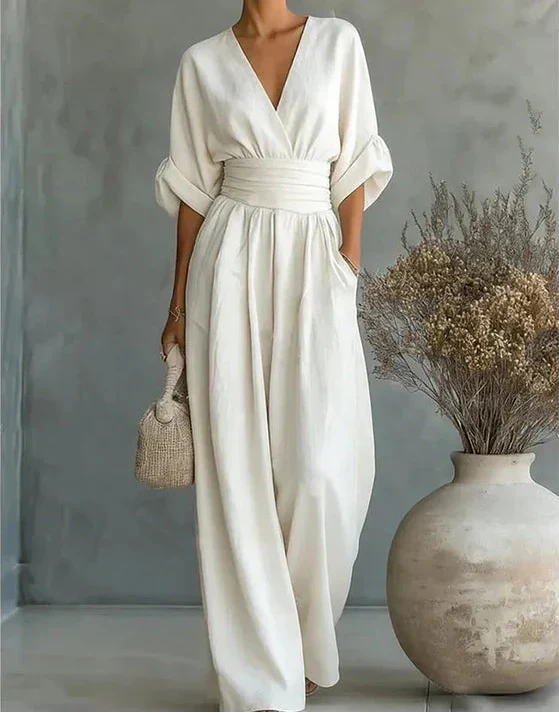 MONICA | ELEGANTES JUMPSUIT MIT V-AUSSCHNITT UND WEITEM BEIN